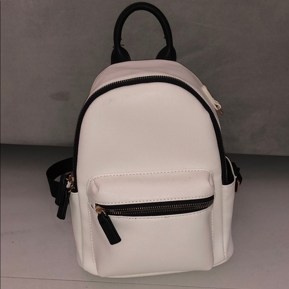 crossi Handbags - NEVER USED white mini backpack
